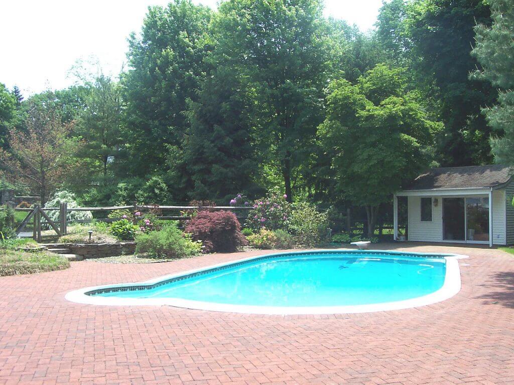 Swimming pool in a back yard